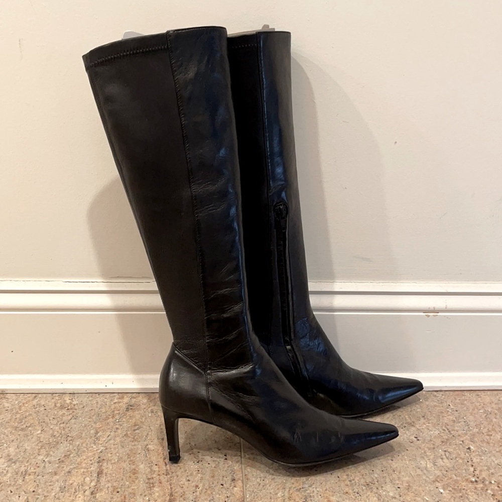 Richard Tyler black knee-high boots with 1.5-2” heel. Size 6.